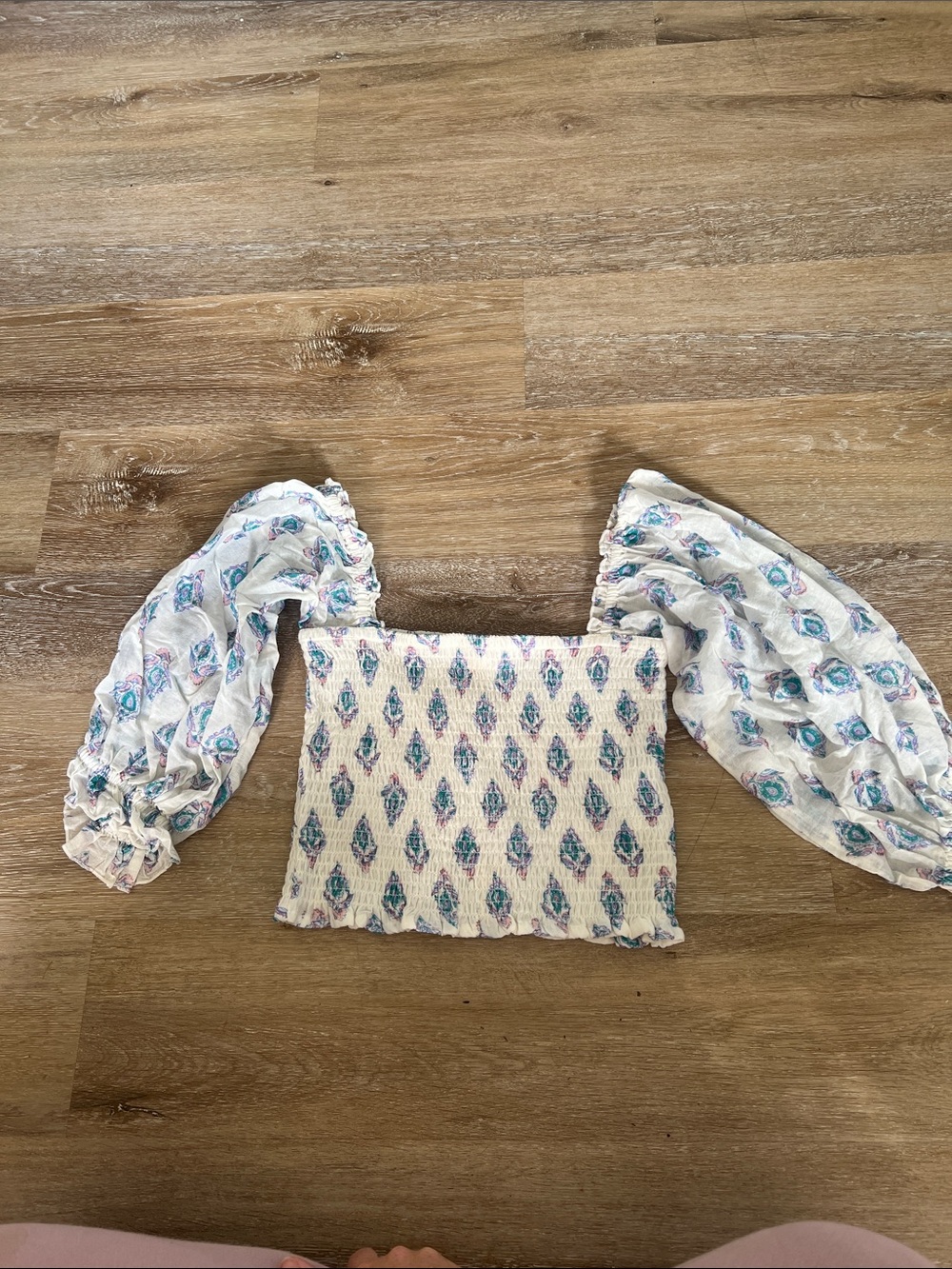 Smocked Off-Shoulder Puff Sleeve Top in White with Teal Print